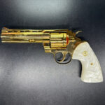 Gold Colt Python 5" with pearl grips