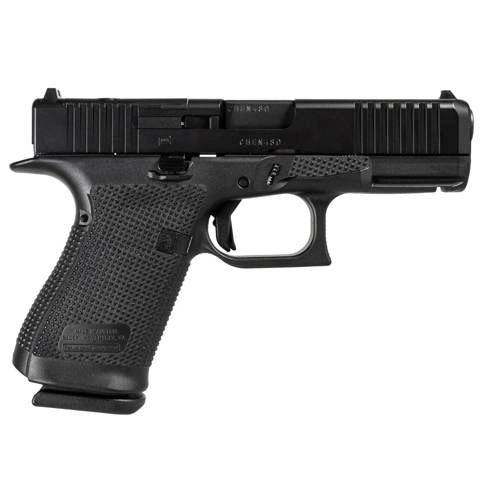 A Glock 19 in black with a ported slide and an optic cut, finished without any colour work. The plainest gun Shark Coast sends us and deliberately so.