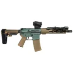 Jade green receiver set against FDE handguard, brace and furniture, with a Vortex red dot and Streamlight weapon light already fitted. Two-tone done deliberately rather than from leftover parts.