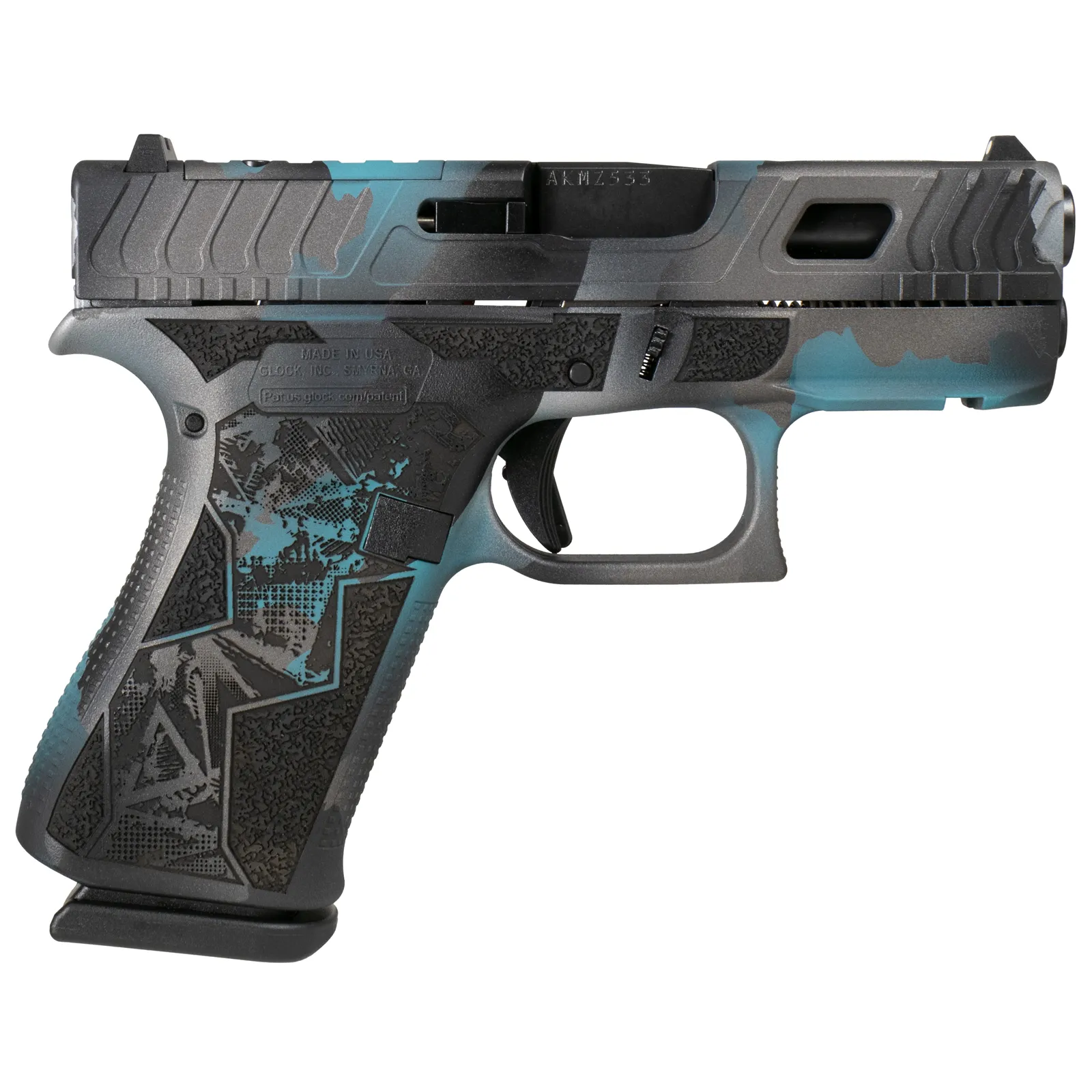 Teal showing through torn grey and black camo, with an angular engraved pattern across the frame. Looks like the finish has been ripped open rather than sprayed on.
